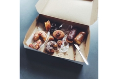 Baked goods in paper box.